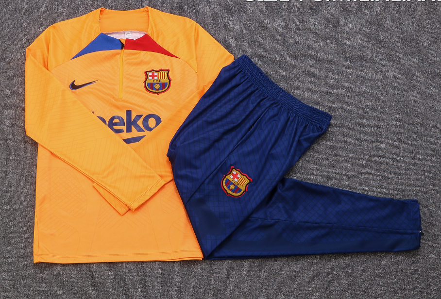 Barcelona 22-23 Oranger Trainingsanzug