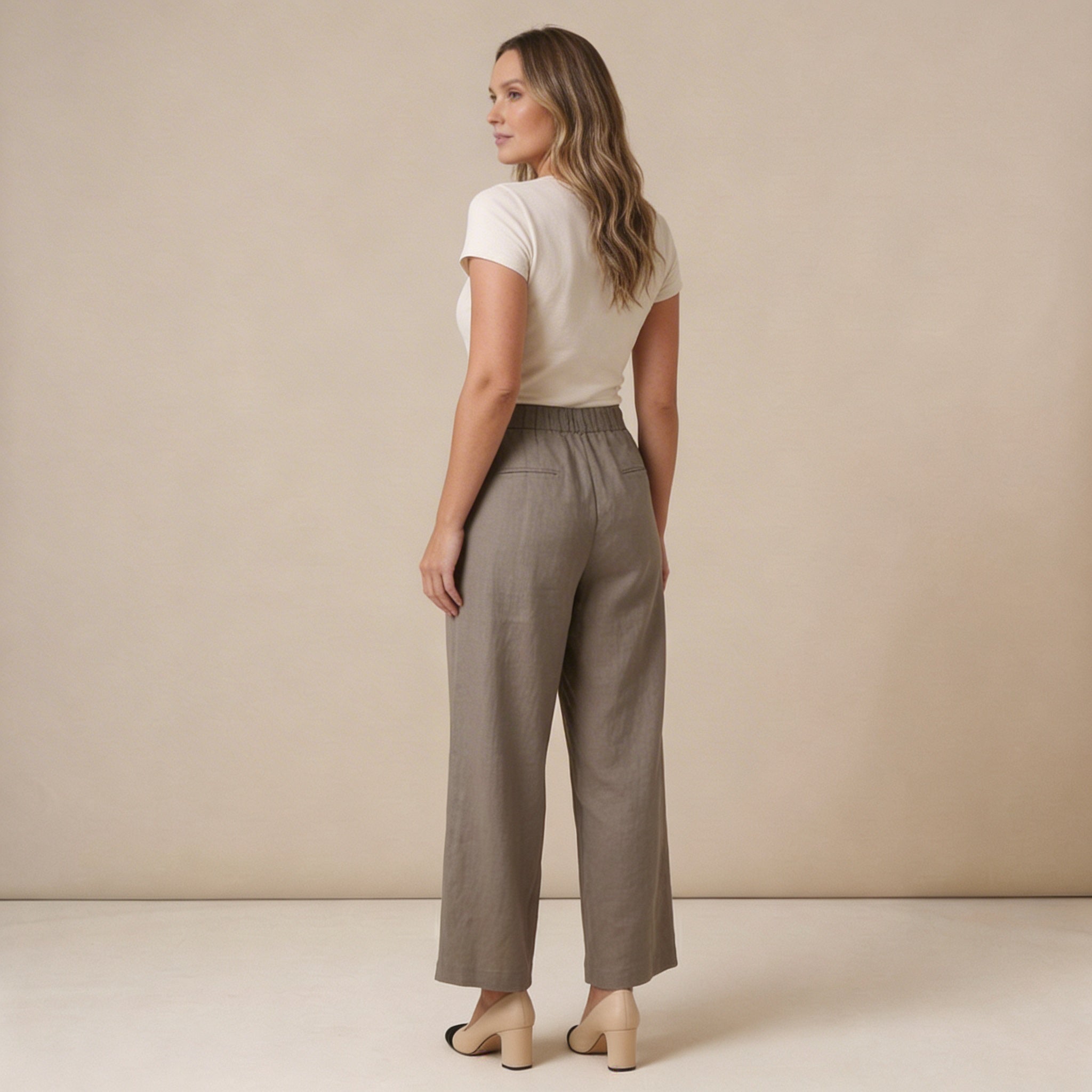 Pantaloni da donna in lino, vita alta, gamba larga, chiusura con bottoni e zip