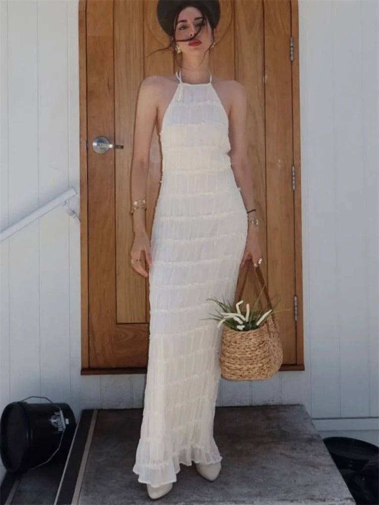 Abito maxi da donna collo halter schiena scoperta design plissettato
