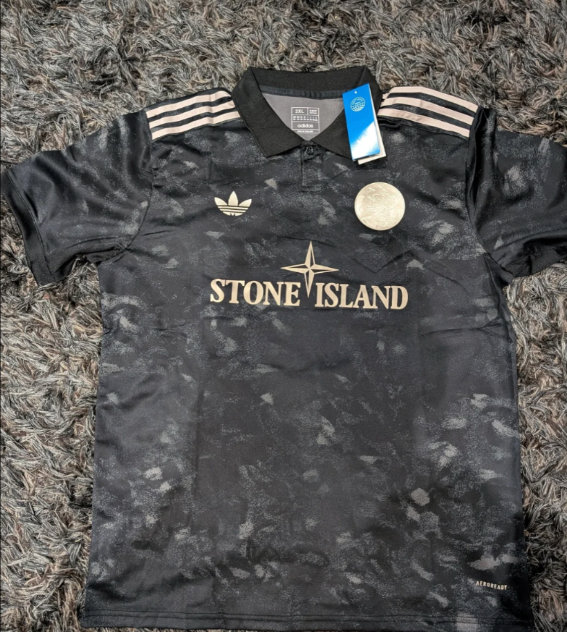 Ajax-Stone Island Fußballtrikot 2024-2025