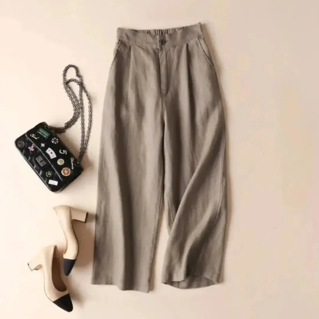 Pantaloni da donna in lino, vita alta, gamba larga, chiusura con bottoni e zip