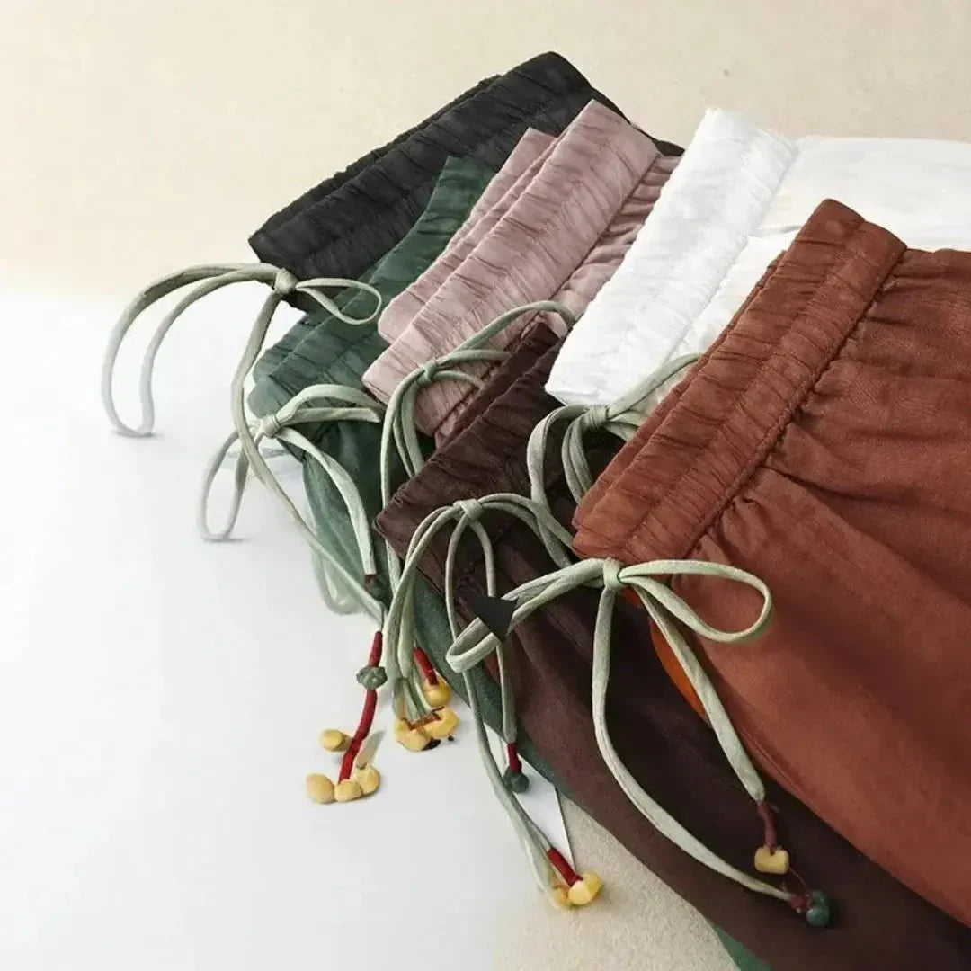 Pantaloni da donna in lino, vestibilità rilassata, gamba affusolata, vita con coulisse