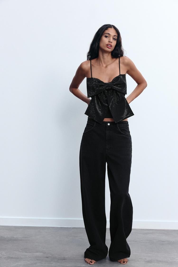 Top corto da donna — Dettaglio con fiocco e design scintillante
