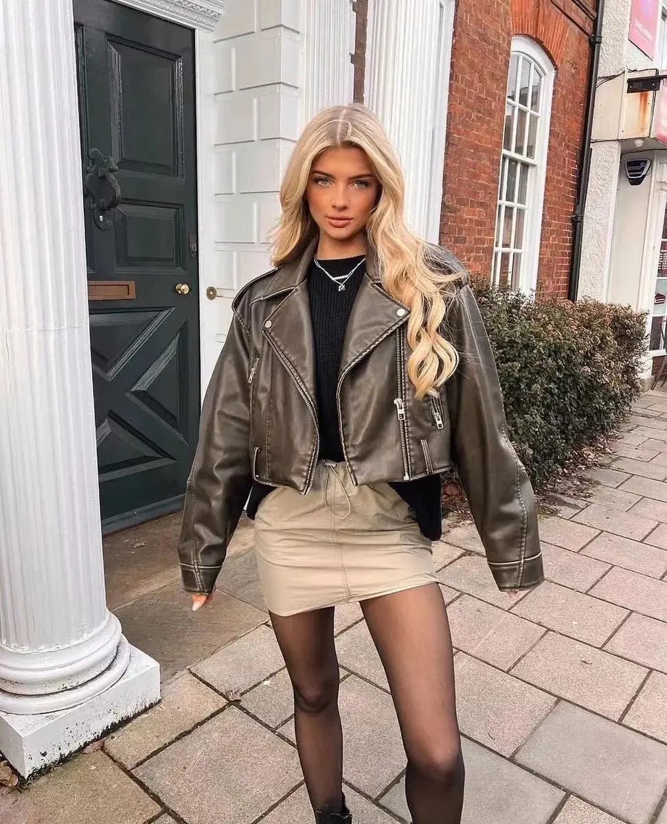 Veste femme — Coupe oversize, longueur courte, fermeture ceinturée